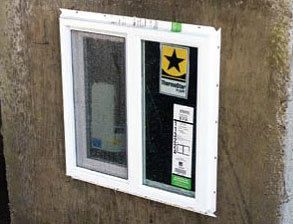 Egress window placed inside a concrete foundation